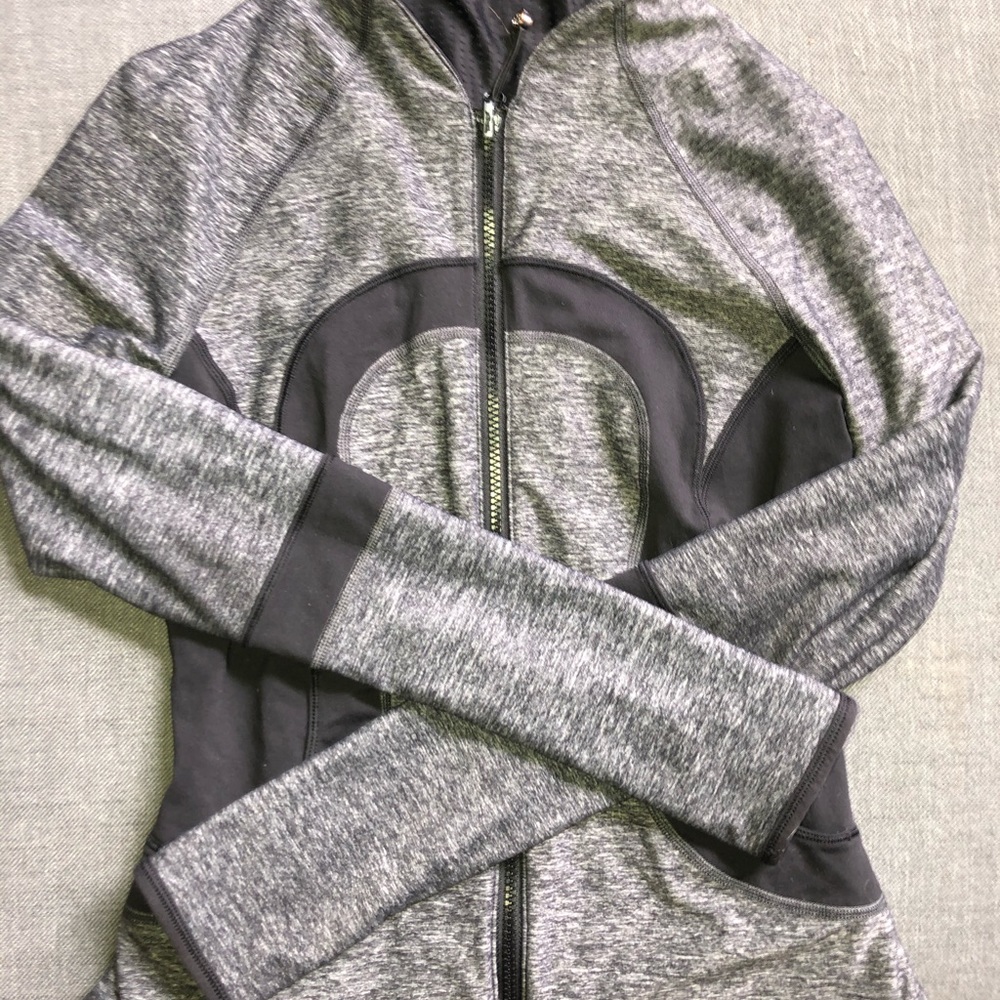 gray and black lululemon zip up jacket